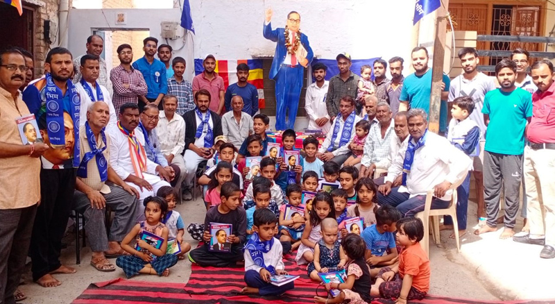 School material distributed to children on Ambedkar Jayanti