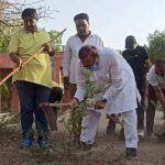Dr. Kalla used shovel in Harsolava, cut bushes