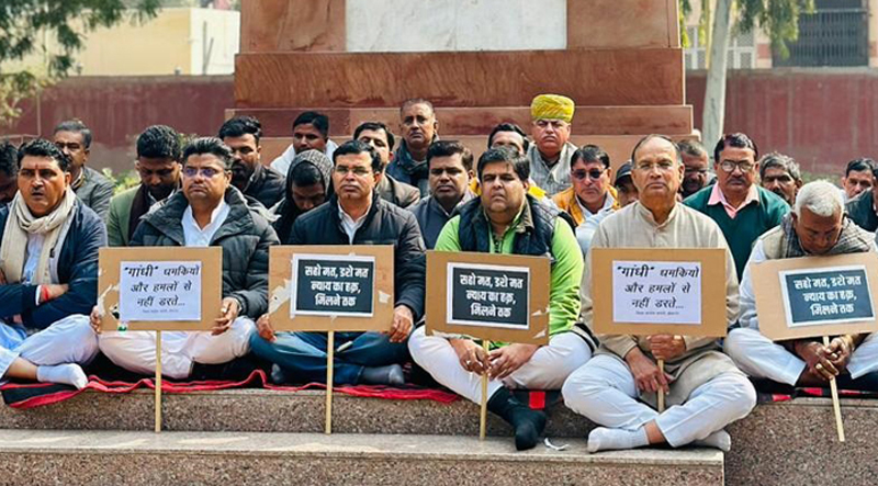 City and rural Congress officials and workers sitting silently in Gandhi Park