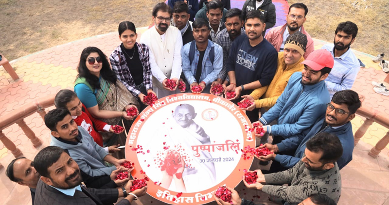 Floral tribute given to Bapu with rose petals in MGSU