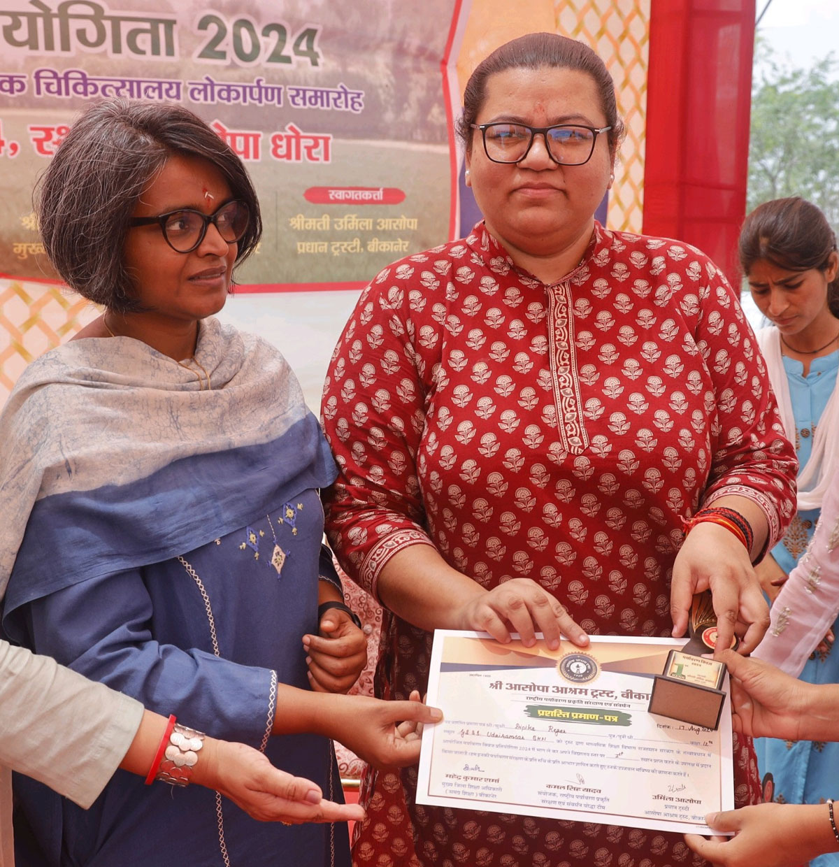 Certificates and symbols presented to environment quiz winners