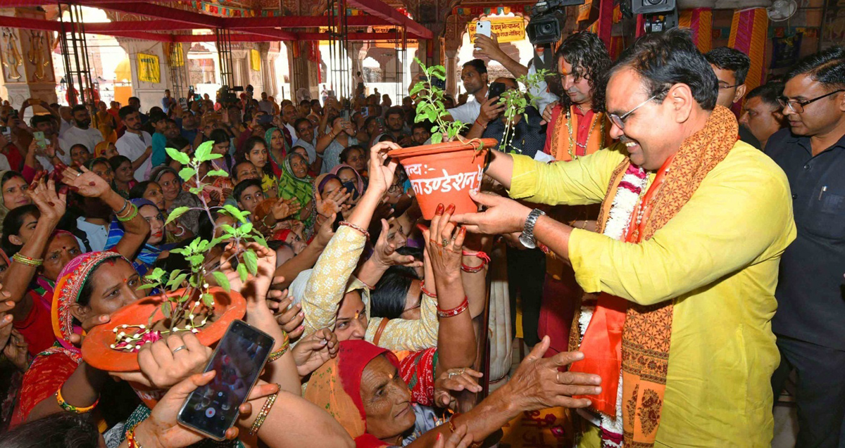 CM distributed Tulsi plants on PM's birthday